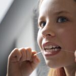 person taking care teeth hygiene 1
