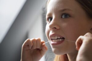 person taking care teeth hygiene 1